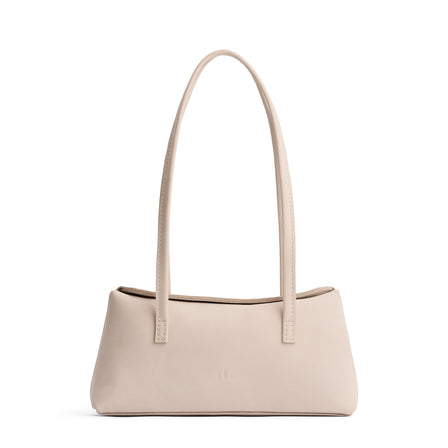 Dragon Bone | Leather bowler bag with magnetic closure against a white background