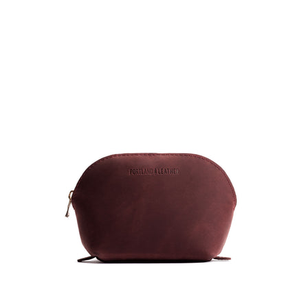 Merlot | Leather makeup bag with curved top zipper and flat bottom