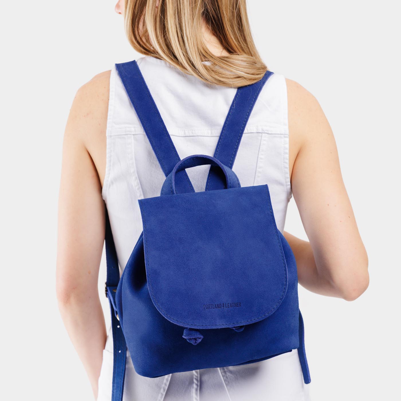 Joni Blue | Model wearing slouchy leather bucket backpack