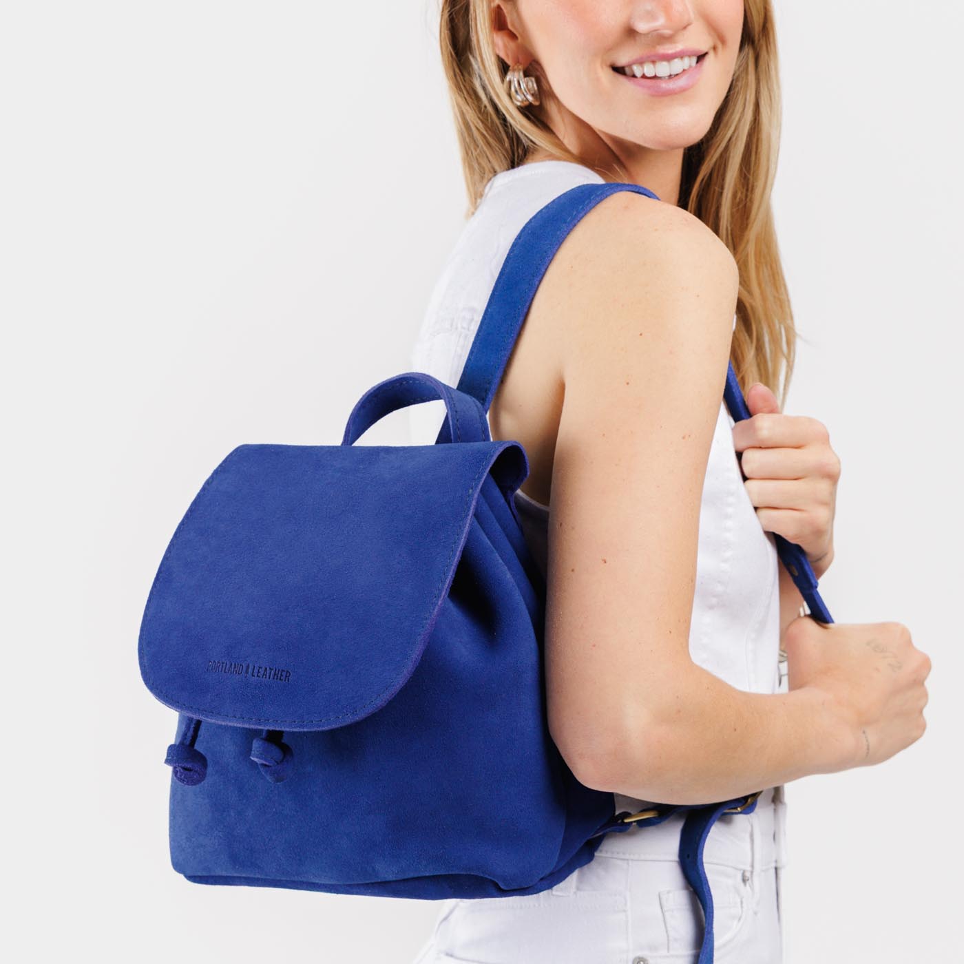 Joni Blue | Model wearing slouchy leather bucket backpack