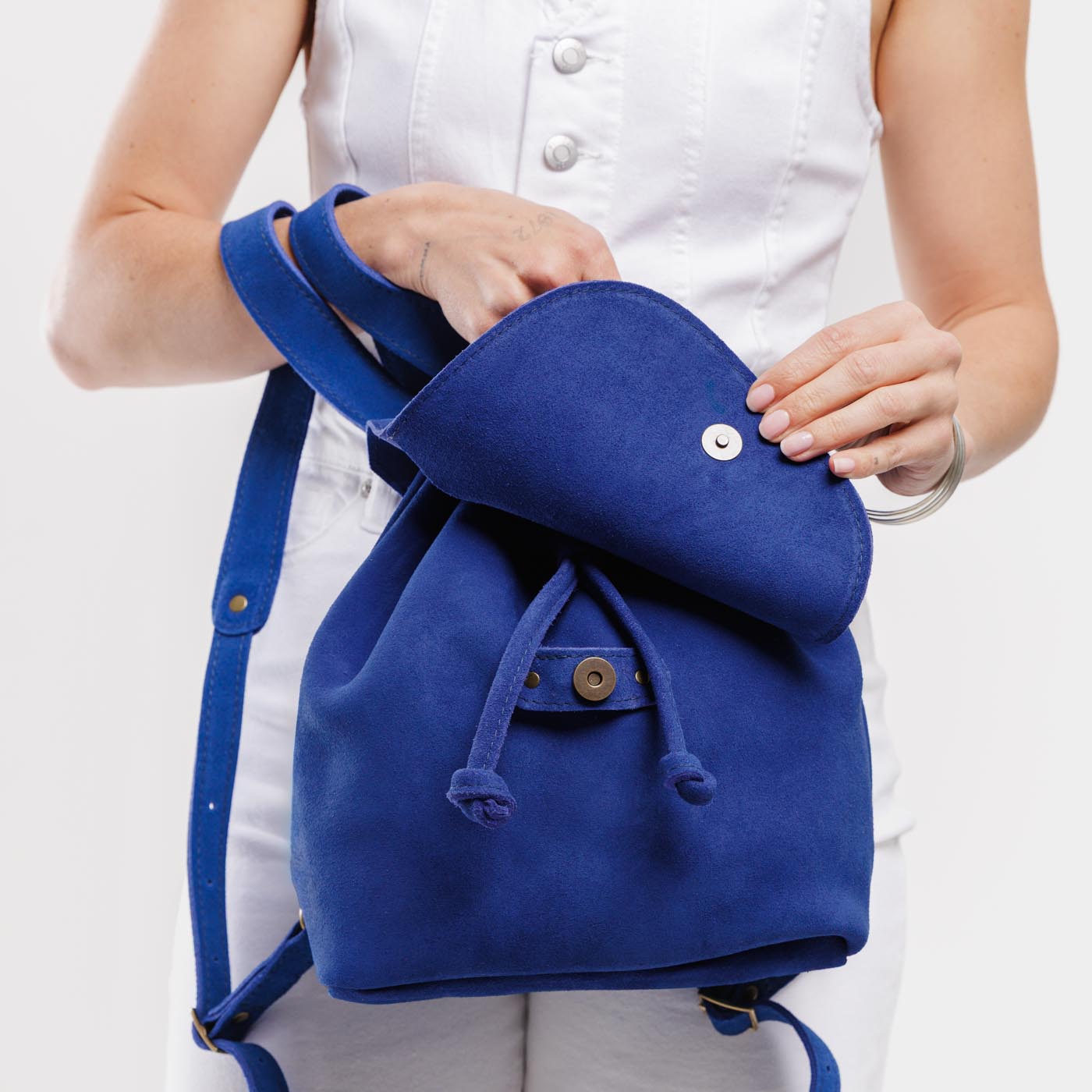 Joni Blue | Model wearing slouchy leather bucket backpack