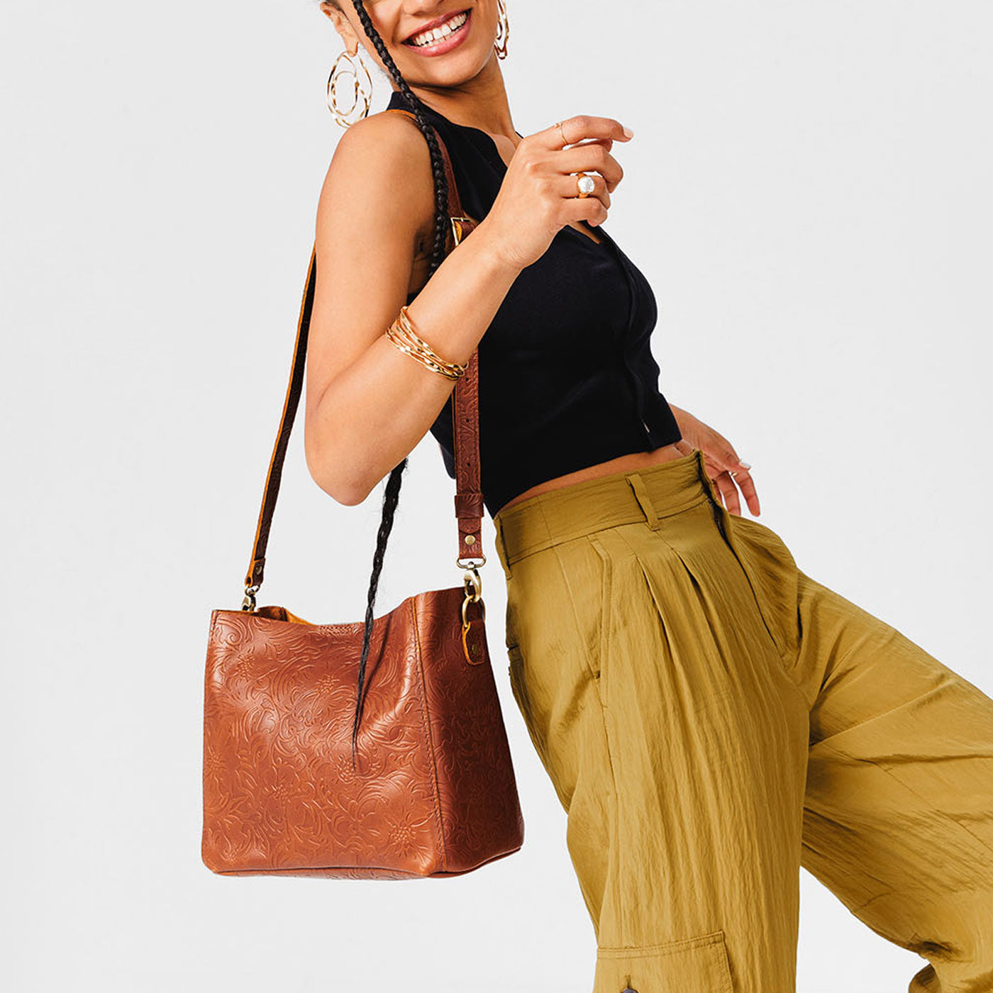  Meadow | symmetrical bucket bag with latch closure and removable crossbody strap