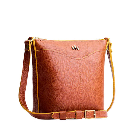 Sienna | Rectangular side bag with curved front pocket and metal tree shaped badge