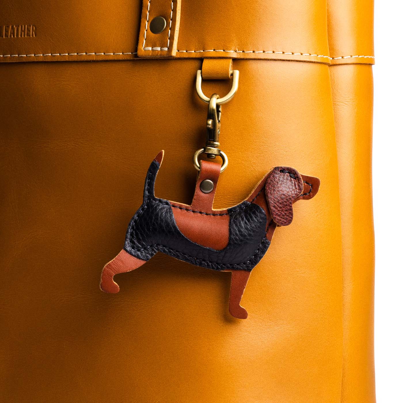 Nutmeg | Leather hound dog shaped keychain with metal lobster clasp