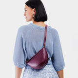 Lollipop Small | Model wearing petite half circle shaped sling bag
