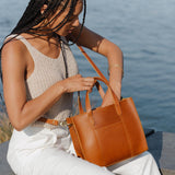 Honey | Structured mid-size tote bag with overlapping panels and crossbody strap 