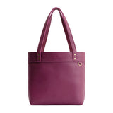 Iris | Leather tote bag with riveted straps and exterior key loop