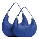 Molino Blue | Crescent shaped shoulder bag with zipper closure and adjustable strap