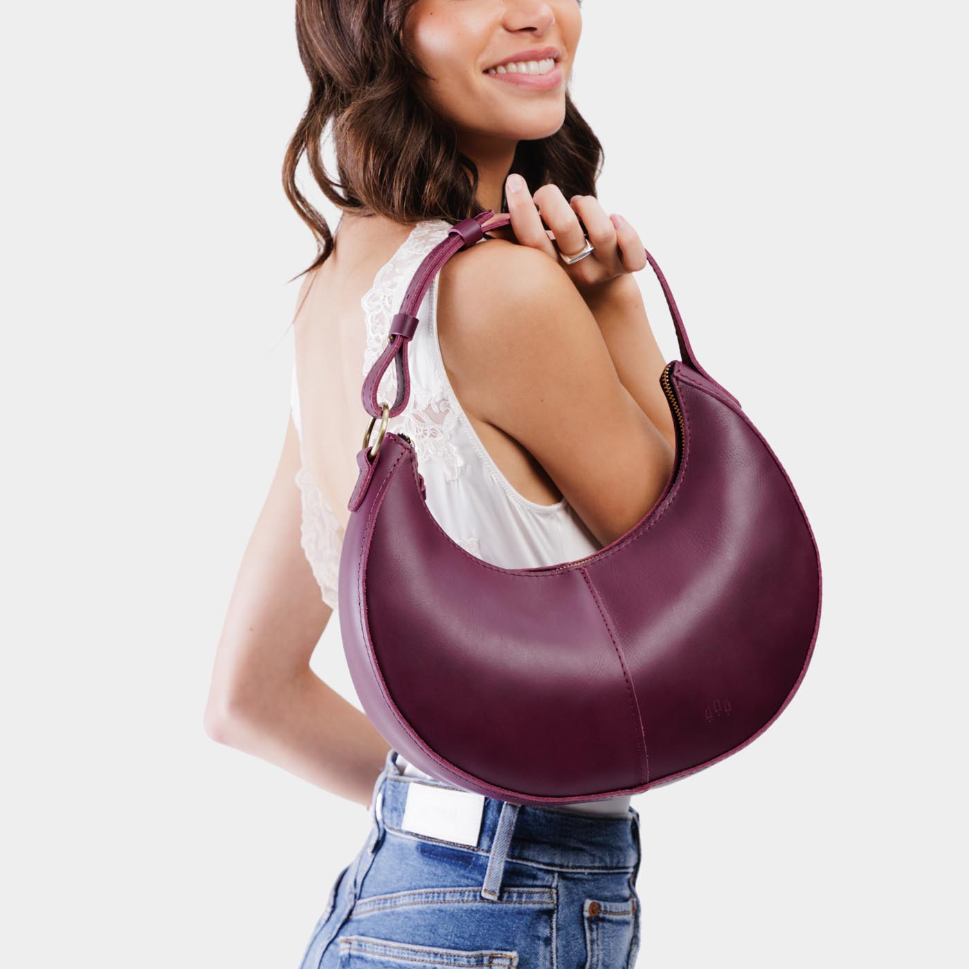 Lollipop*Classic | Crescent shaped shoulder bag with zipper closure and adjustable strap