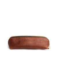 Nutmeg | Leather pouch with curved seams and top zipper