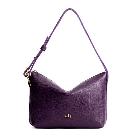 Empire*Large | Medium sized slouchy leather shoulder bag with zipper opening and three metal tree emblems