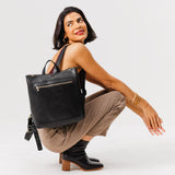 All Color: Black Classic | Model wearing square slim leather tote backpack