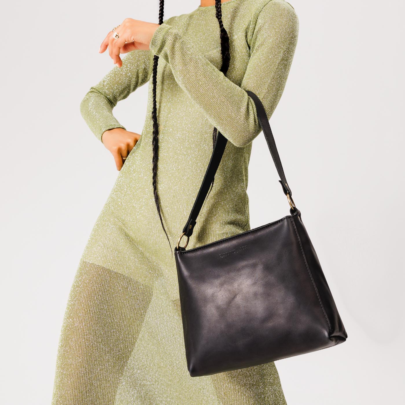  Black | Triangular shoulder bag with antiqued brass finished hardware