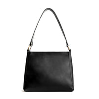 Black | Triangular shoulder bag with antiqued brass finished hardware