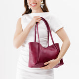 Orchid Medium | Model holding midsize rectangular tote bag