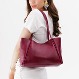Orchid Medium | Model holding midsize rectangular tote bag