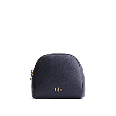 Night Owl | Curved top leather pouch with zipper opening, flat base, and three metal tree emblems in front