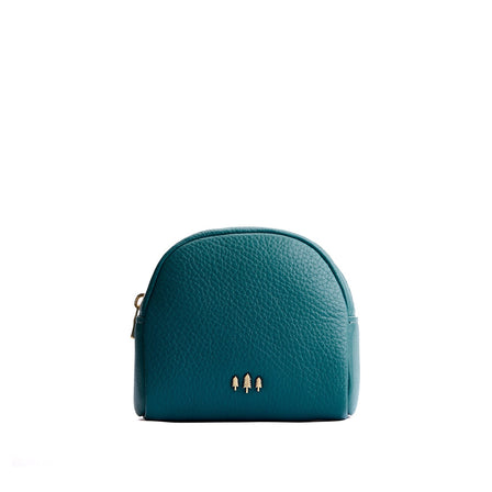 Soul Blue | Curved top leather pouch with zipper opening, flat base, and three metal tree emblems in front