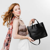 Black | Midsize crossbody tote with handles and a pocket