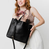 Black | Midsize crossbody tote with handles and a pocket