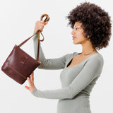  Cognac  | Small rectangular crossbody purse with top zipper and interior pocket