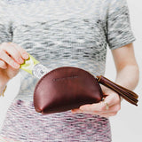Cognac | Small leather zippered pouch with tassel