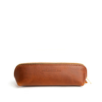 All Color: Honey | Leather pouch with curved seams and top zipper