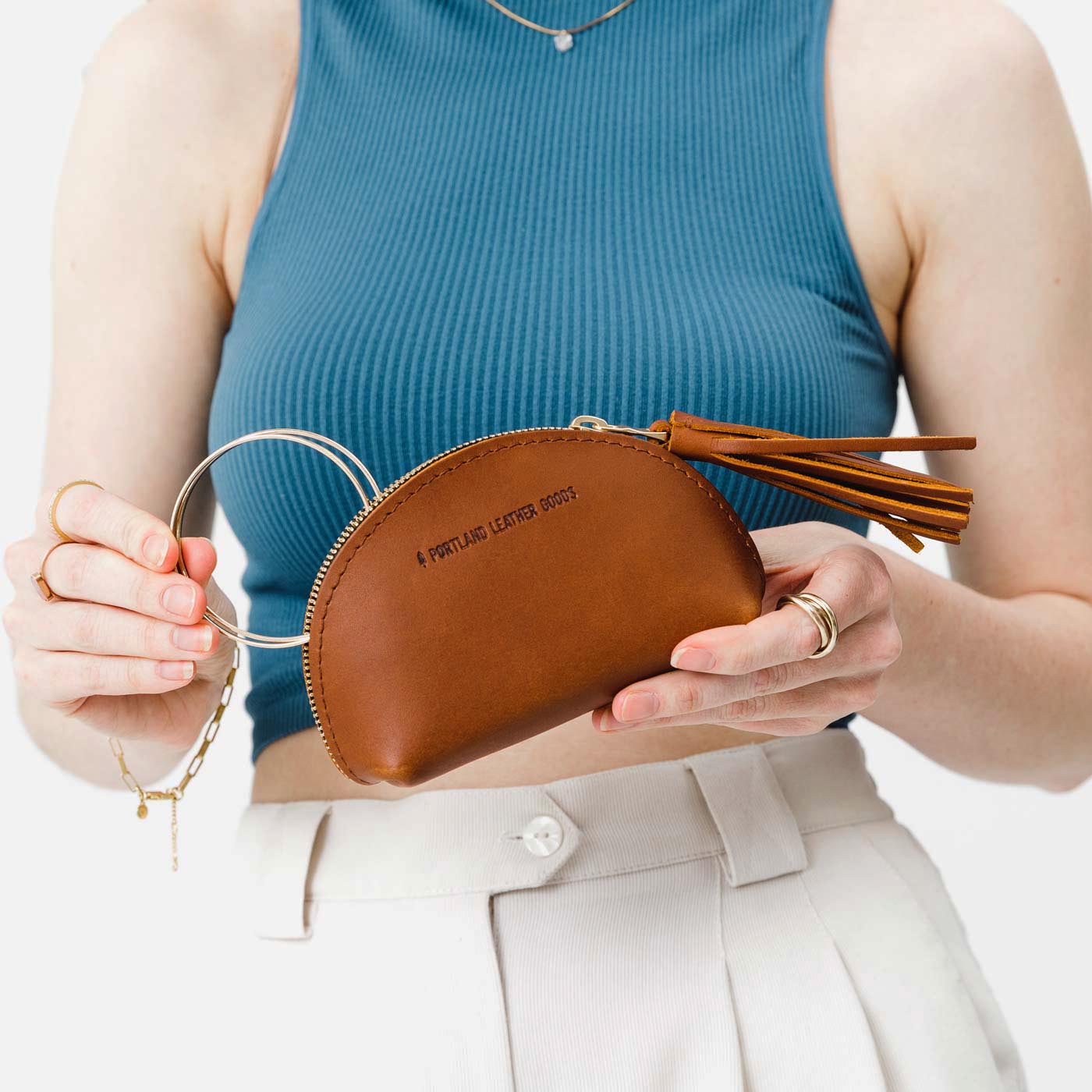 Honey | Small leather zippered pouch with tassel