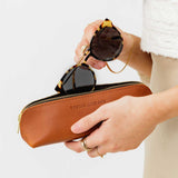 All Color: Honey | Leather pouch with curved seams and top zipper